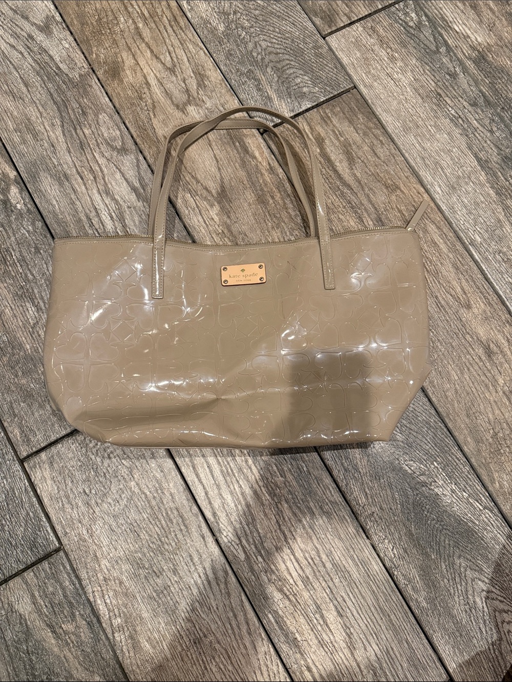 kate spade glossy taupe patent tote has a few minor scuffs needs a little TLC